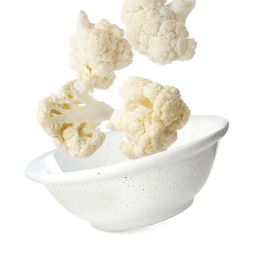Image of Cauliflower florets and bowl in air against white background