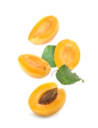 Image of Fresh juicy apricots falling against white background