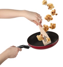 Image of Woman tossing cauliflower while frying it in wok against white background, closeup