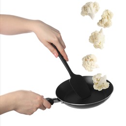 Image of Woman tossing cauliflower while frying it in wok against white background, closeup