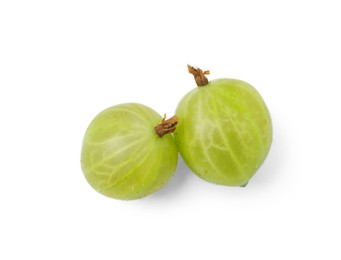 Photo of Two fresh green gooseberries isolated on white, top view