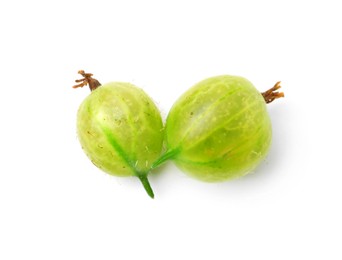 Photo of Two fresh green gooseberries isolated on white, above view