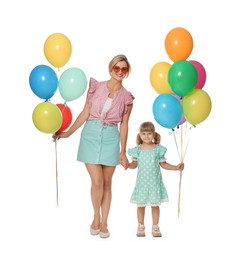 Photo of Happy mother in sunglasses and her little daughter with bunches of colorful balloons holding hands on white background
