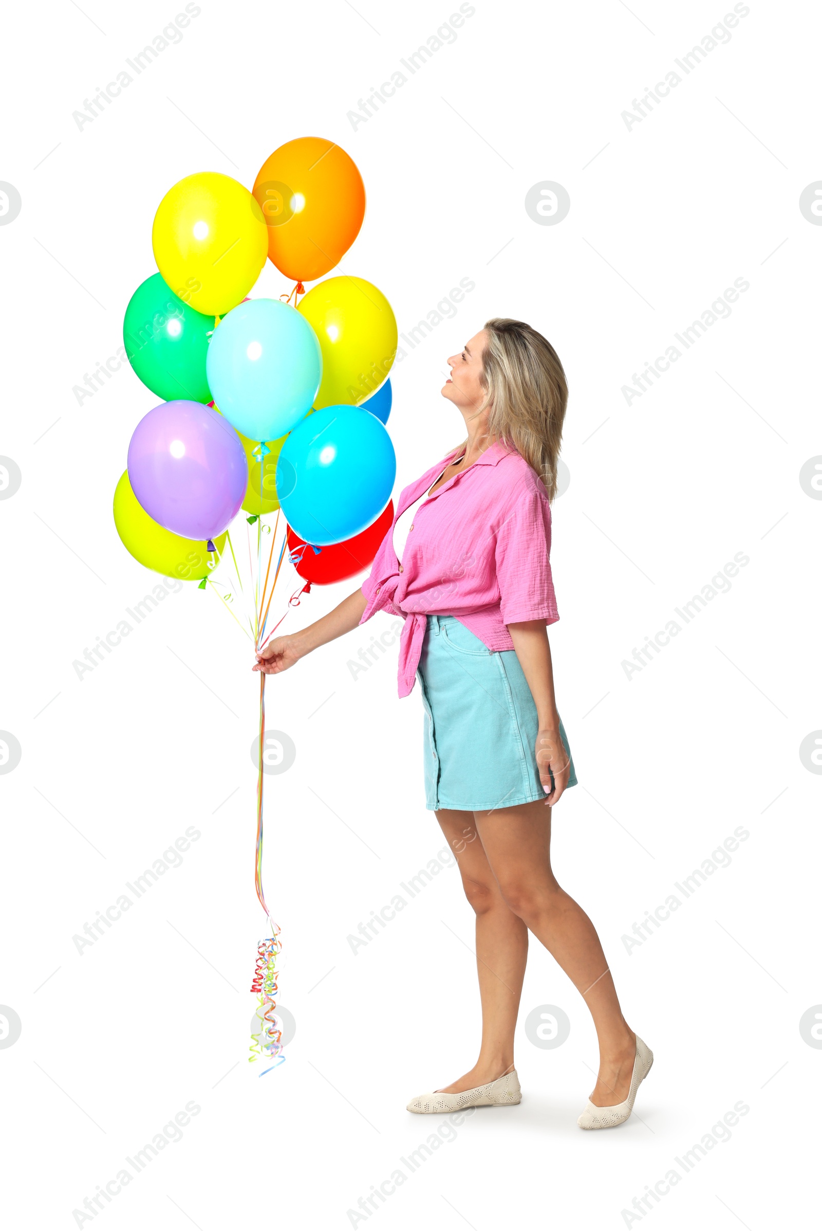 Smiling woman with bunch of colorful balloons on white background Photo of Smiling woman with bunch of colorful balloons on white background