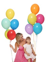 Photo of Happy mother in dress and her little daughter with bunches of colorful balloons on white background