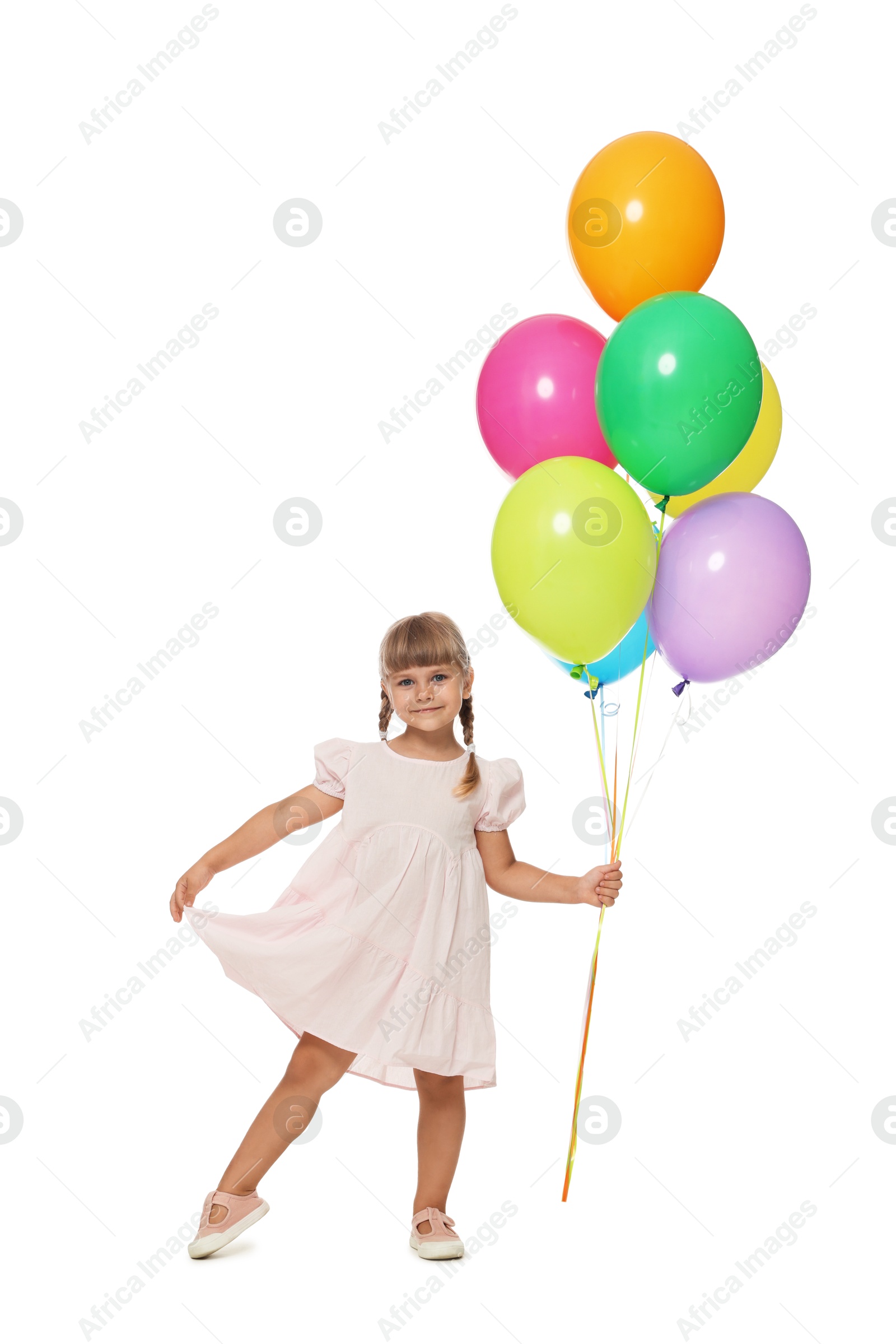 Cute little girl in dress with bunch of colorful balloons on white background Photo of Cute little girl in dress with bunch of colorful balloons on white background