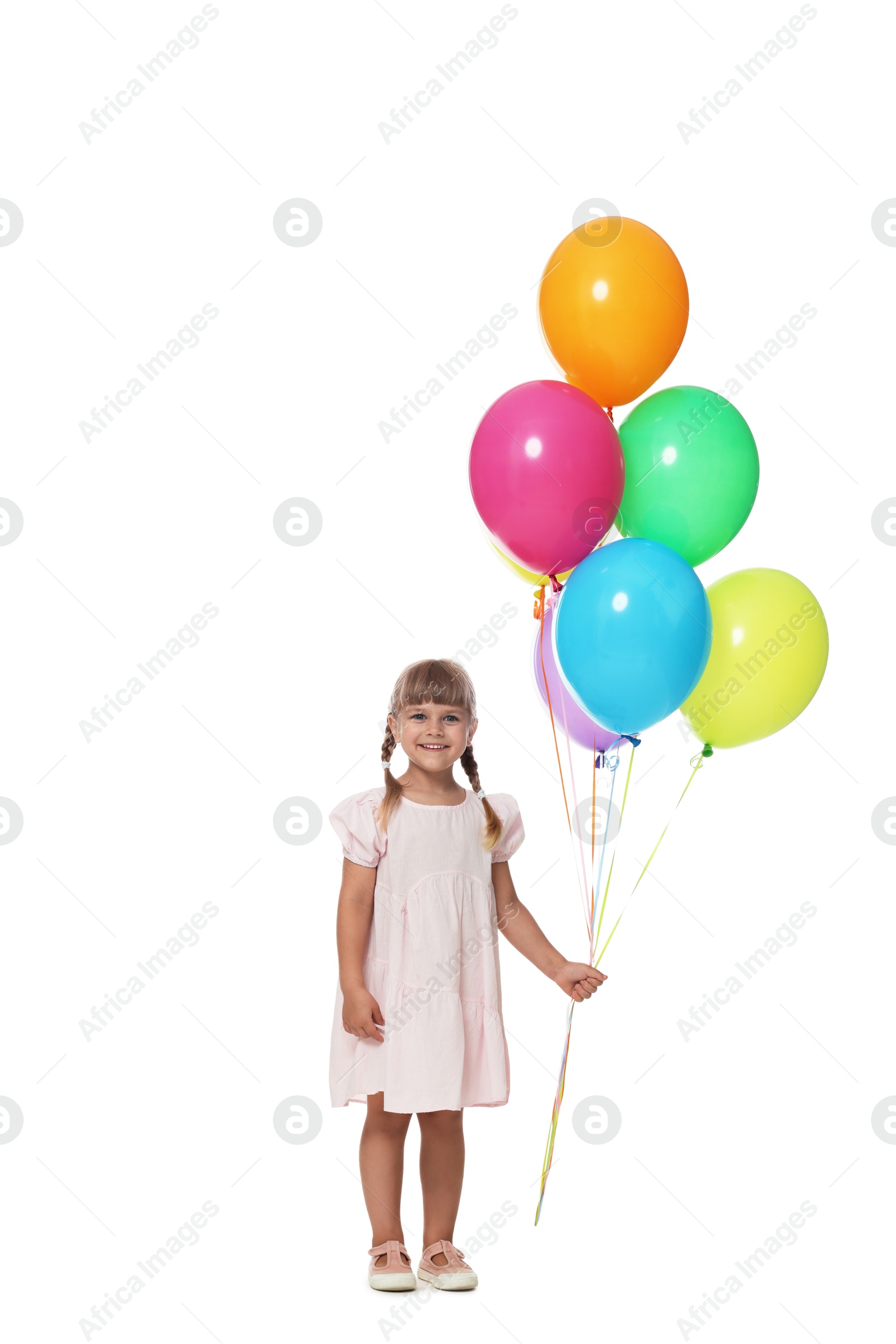 Smiling little girl in dress with bunch of colorful balloons on white background Photo of Smiling little girl in dress with bunch of colorful balloons on white background