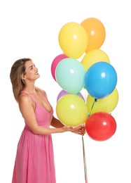 Photo of Smiling woman in dress with bunch of colorful balloons on white background