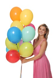 Photo of Smiling woman in dress with bunch of colorful balloons on white background
