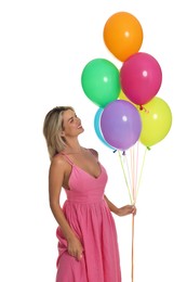 Photo of Smiling woman in dress with bunch of colorful balloons on white background