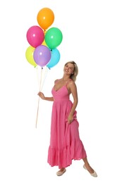 Photo of Smiling woman in dress with bunch of colorful balloons on white background
