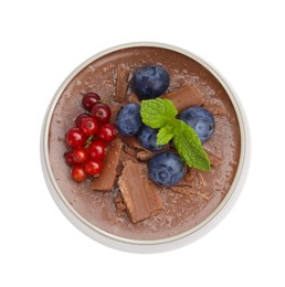Photo of Delicious panna cotta with chocolate, berries and mint isolated on white, top view