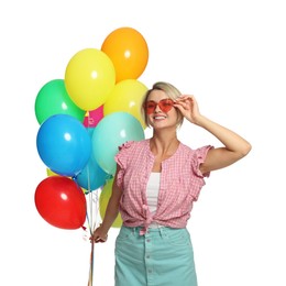 Photo of Smiling woman in sunglasses with bunch of colorful balloons on white background