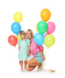 Photo of Happy mother in sunglasses and her little daughter with bunches of colorful balloons on white background