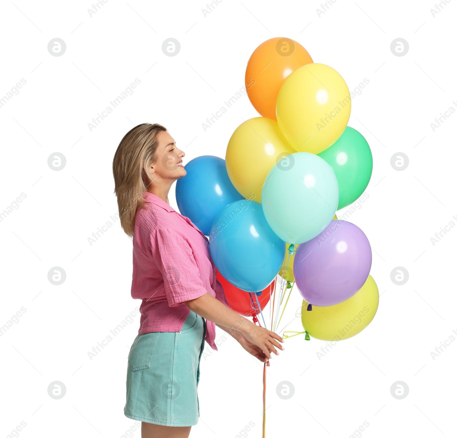 Photo of Smiling woman with bunch of colorful balloons on white background