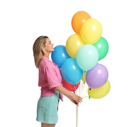 Photo of Smiling woman with bunch of colorful balloons on white background