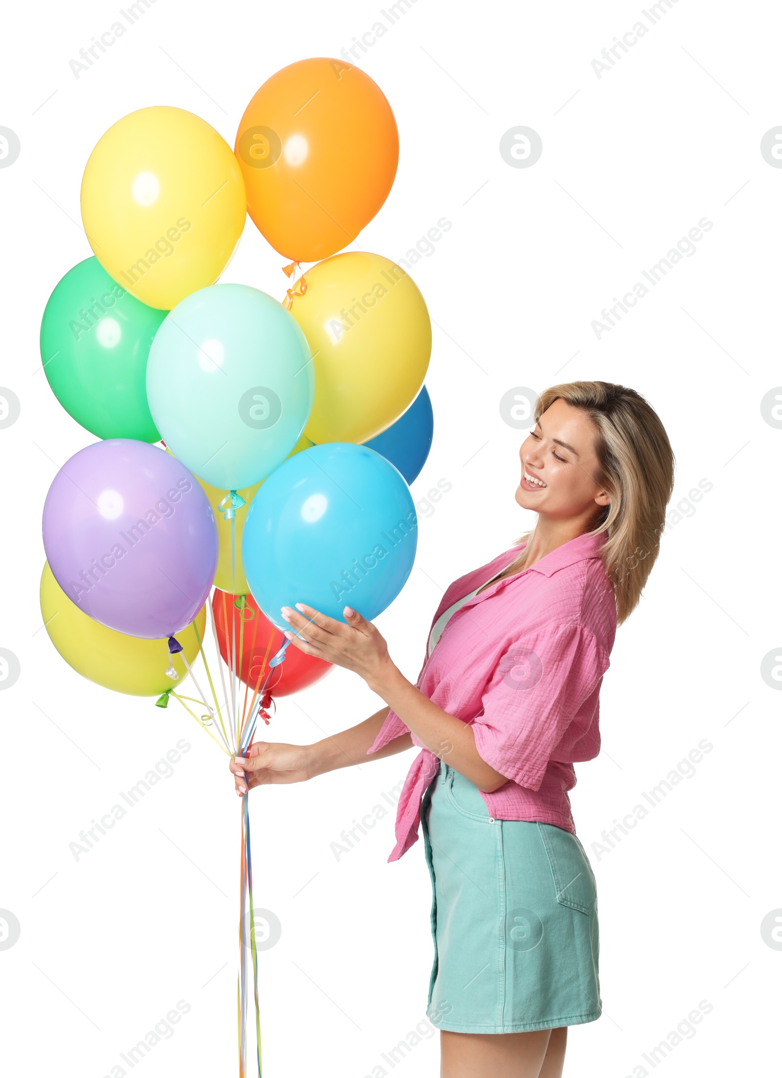 Smiling woman with bunch of colorful balloons on white background Photo of Smiling woman with bunch of colorful balloons on white background