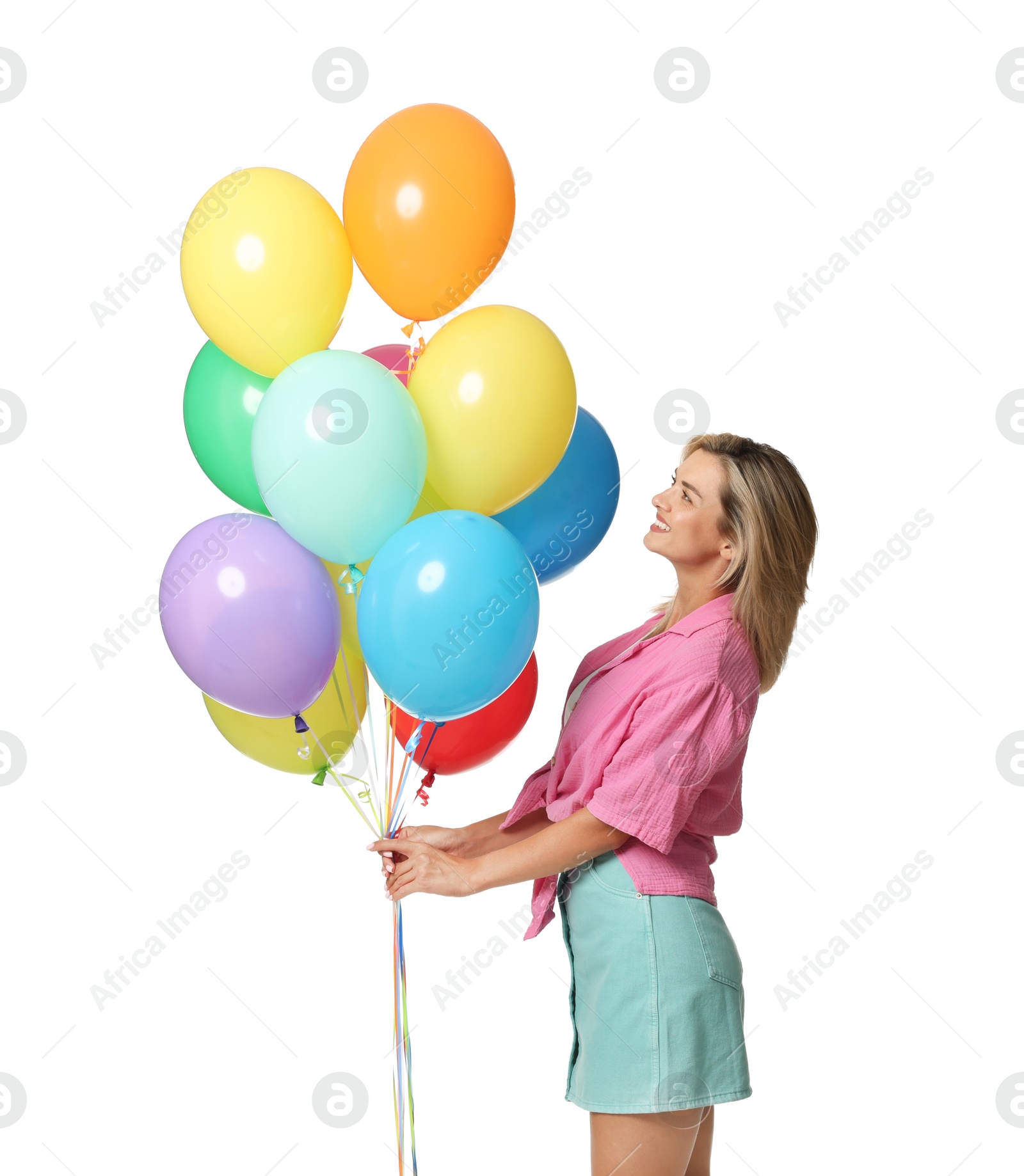 Photo of Smiling woman with bunch of colorful balloons on white background