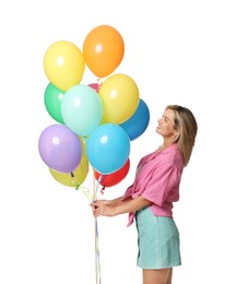 Photo of Smiling woman with bunch of colorful balloons on white background