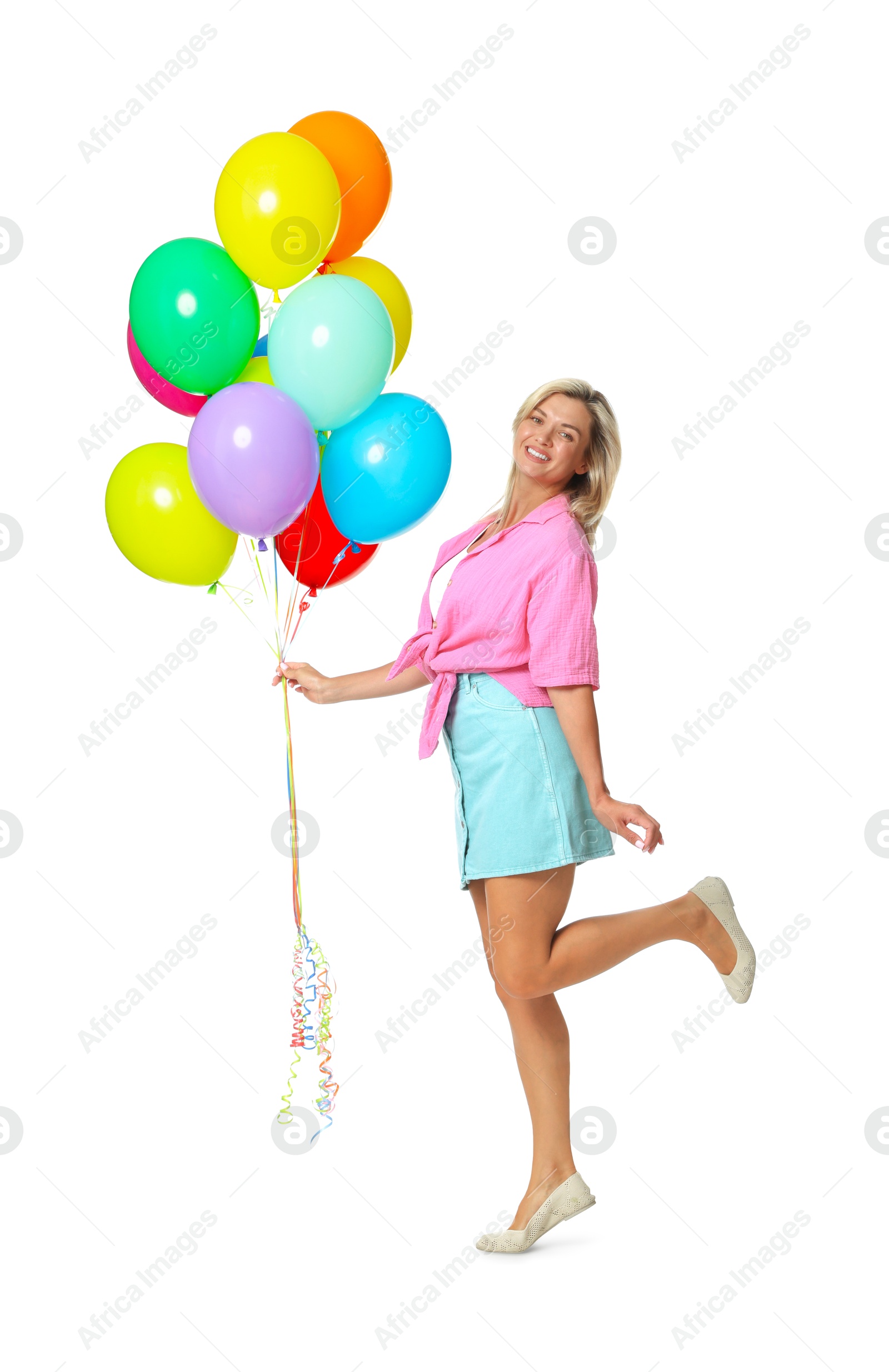 Photo of Smiling woman with bunch of colorful balloons on white background