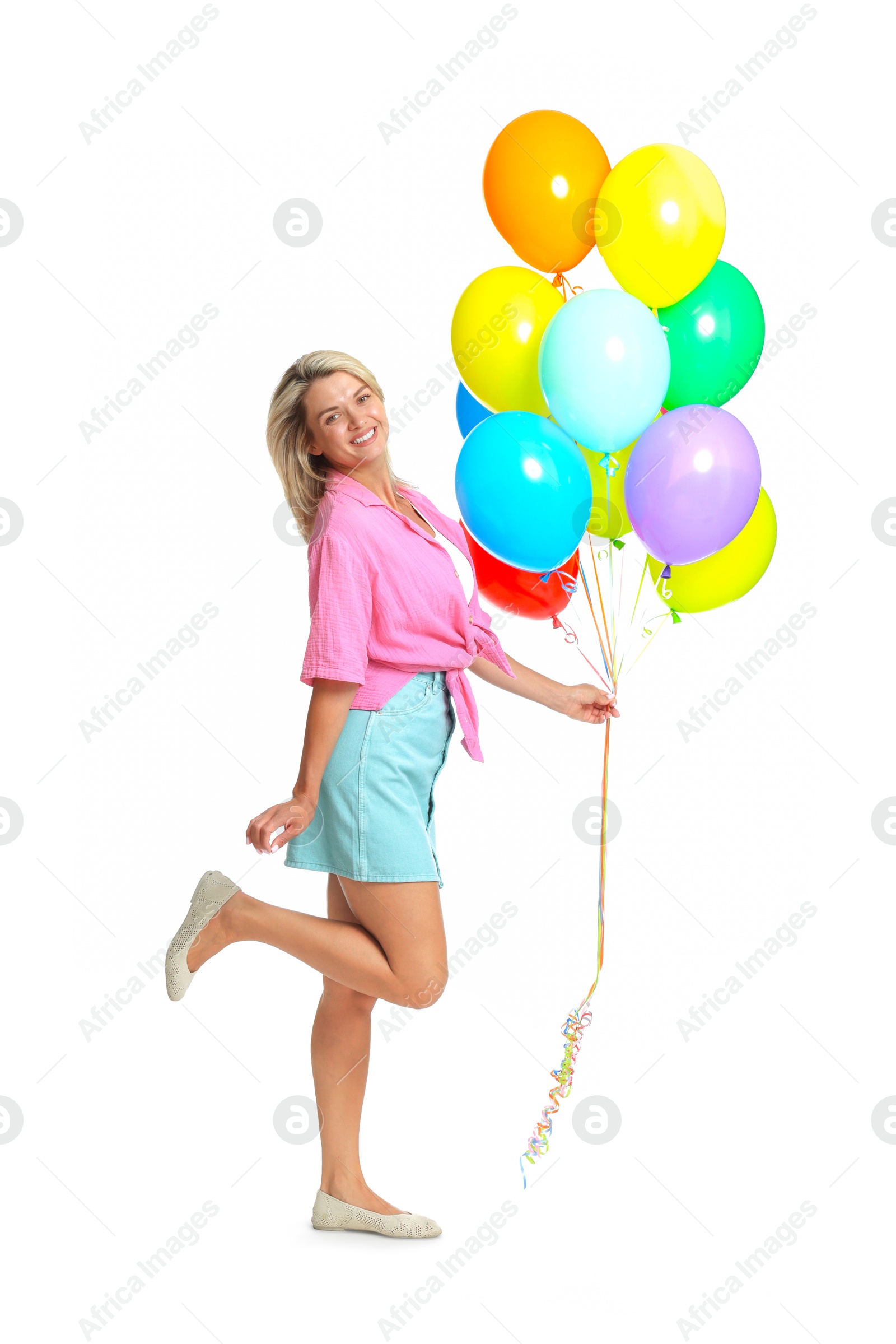 Photo of Smiling woman with bunch of colorful balloons on white background