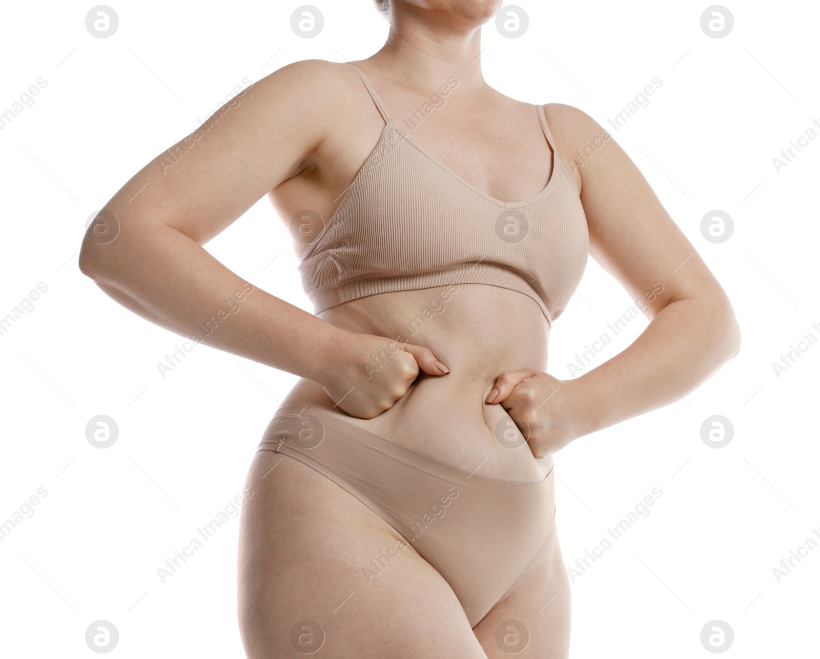 Photo of Liposuction. Woman in underwear touching her belly on white background, closeup