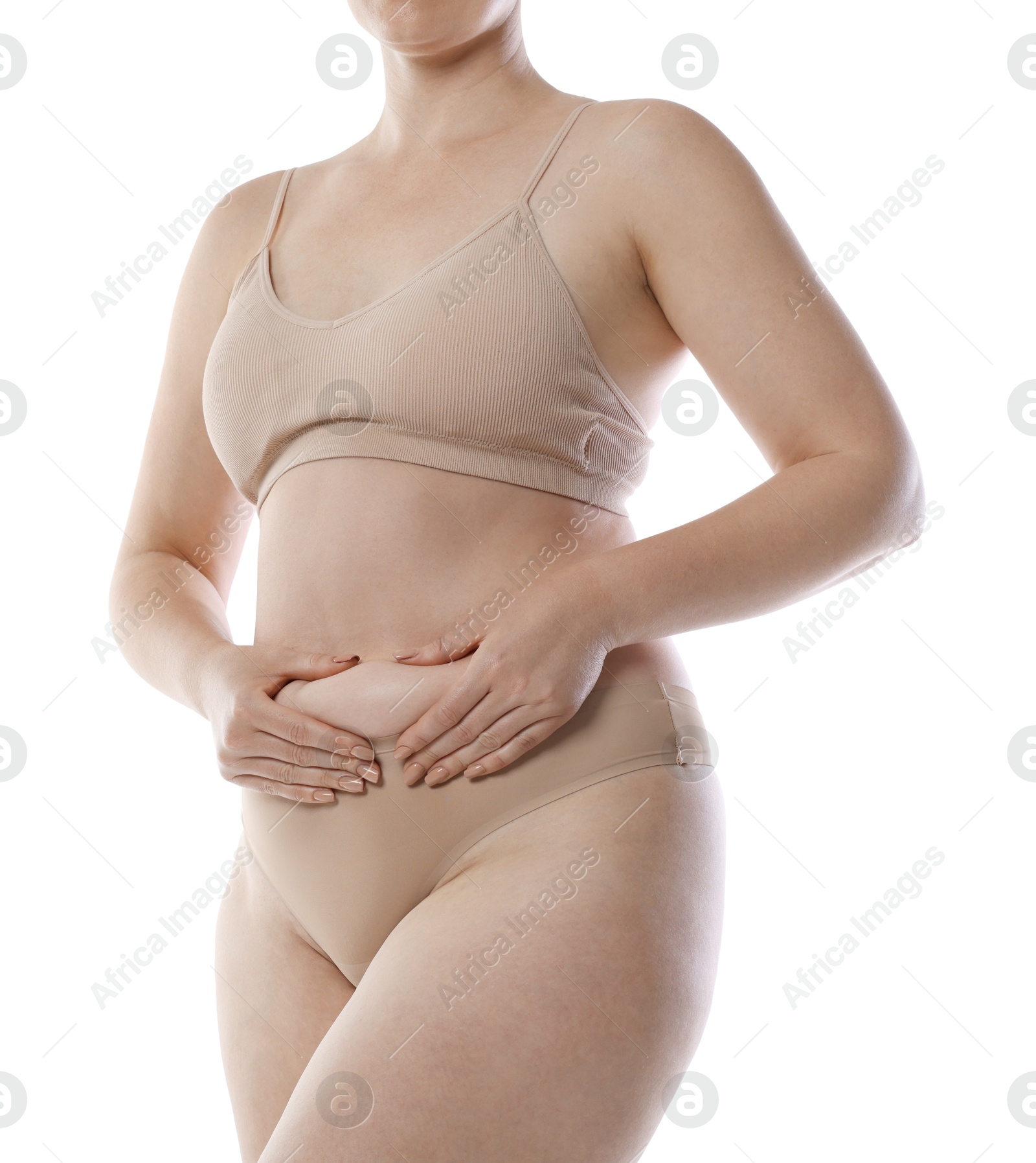 Photo of Liposuction. Woman in underwear touching her belly on white background, closeup