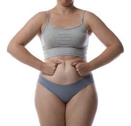 Photo of Liposuction. Woman in underwear touching her belly on white background, closeup