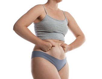 Photo of Liposuction. Woman in underwear touching her belly on white background, closeup