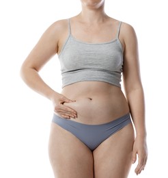 Photo of Liposuction. Woman in underwear touching her belly on white background, closeup