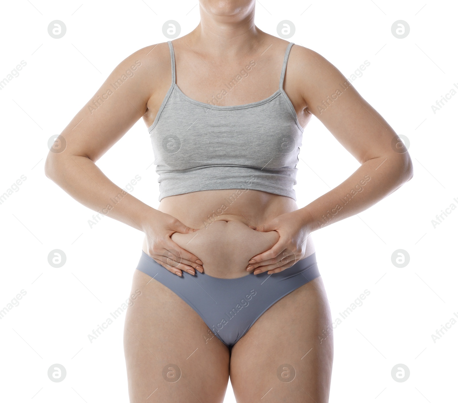 Photo of Liposuction. Woman in underwear touching her belly on white background, closeup