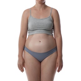 Photo of Liposuction. Woman in underwear on white background, closeup