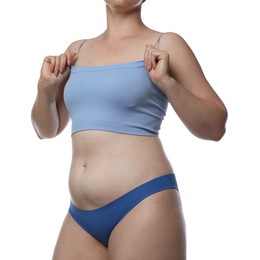 Photo of Liposuction. Woman in underwear on white background