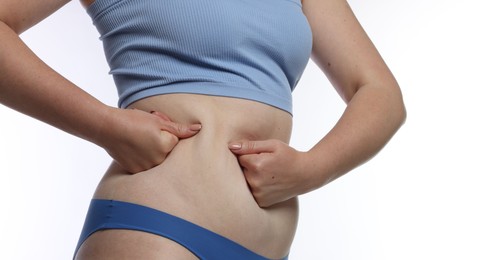 Photo of Liposuction. Woman in underwear on white background