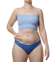 Photo of Liposuction. Woman in underwear touching her belly on white background, closeup