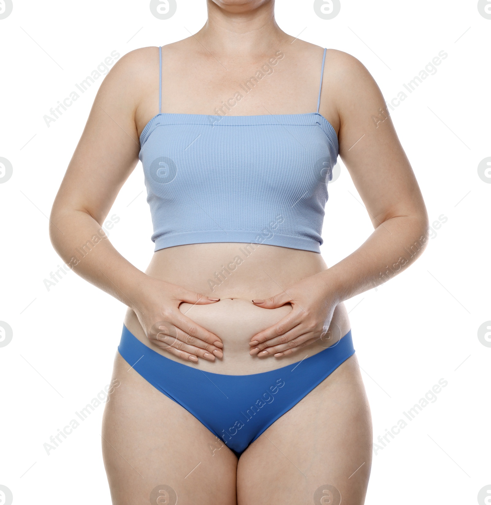 Photo of Liposuction. Woman in underwear touching her belly on white background, closeup