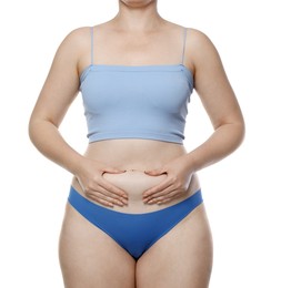 Photo of Liposuction. Woman in underwear touching her belly on white background, closeup