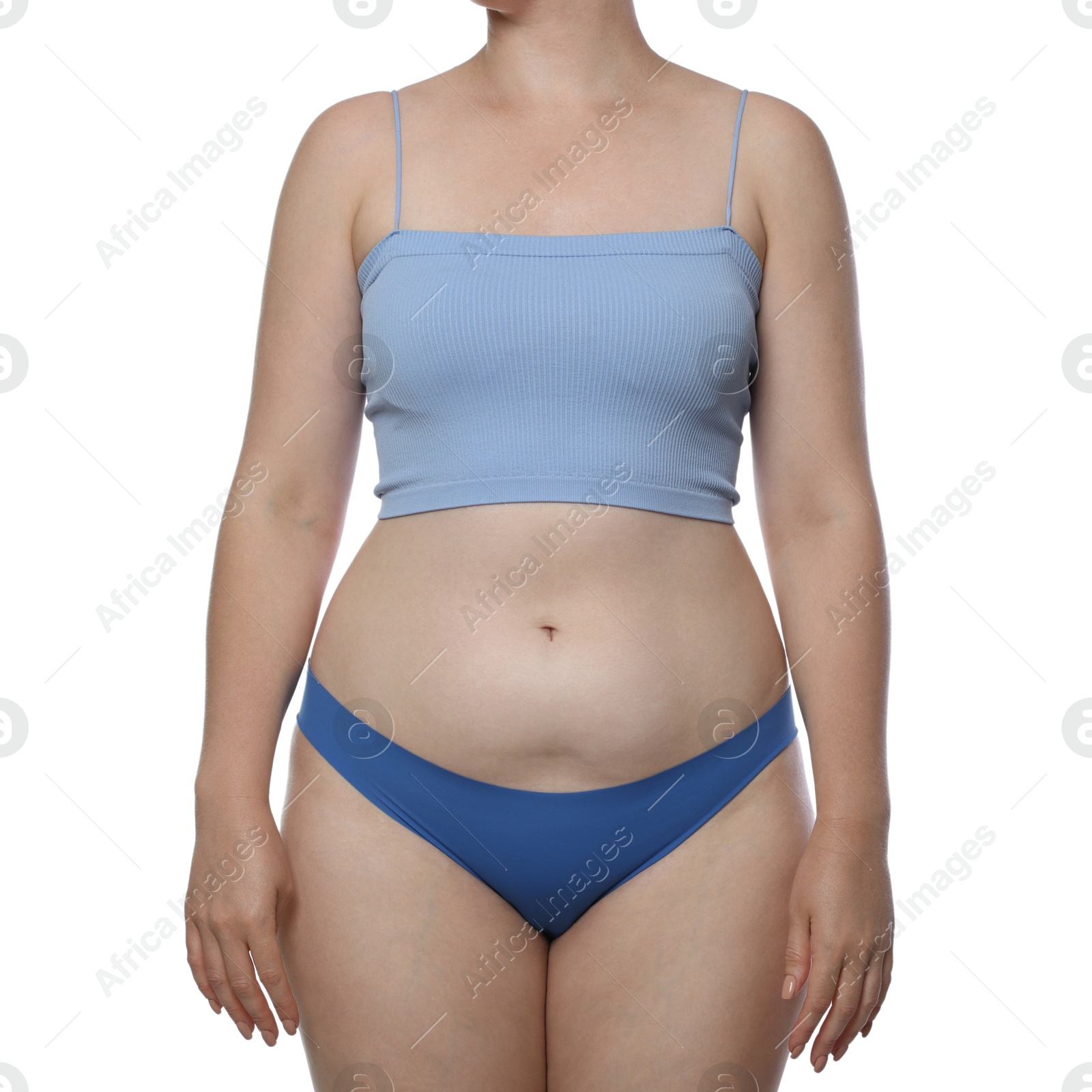 Photo of Liposuction. Woman in underwear touching her belly on white background, closeup