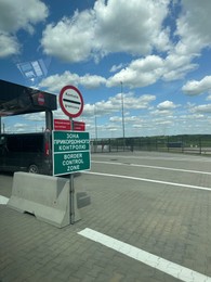 Photo of Malhowice-Nyzhankovychi, Ukraine, Poland - June 21, 2025: Border control checkpoint with sign