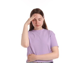 Photo of Young woman suffering from headache on white background