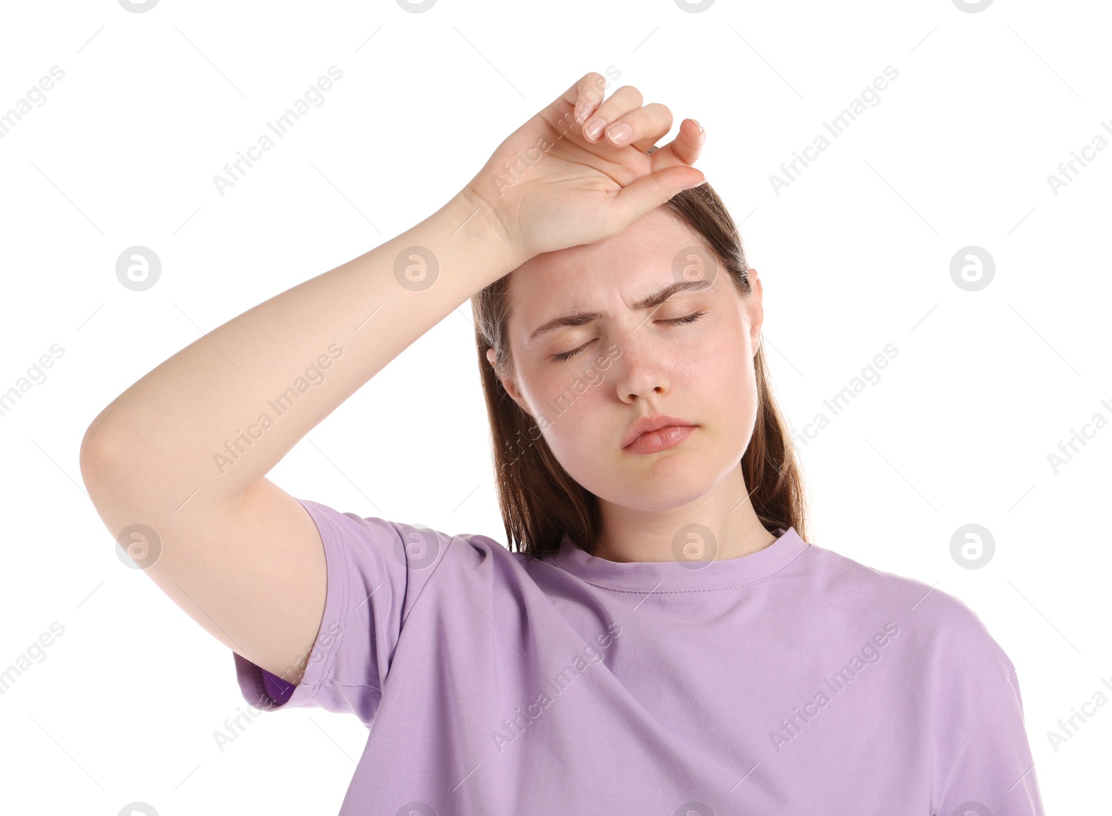 Young woman suffering from headache on white background Photo of Young woman suffering from headache on white background