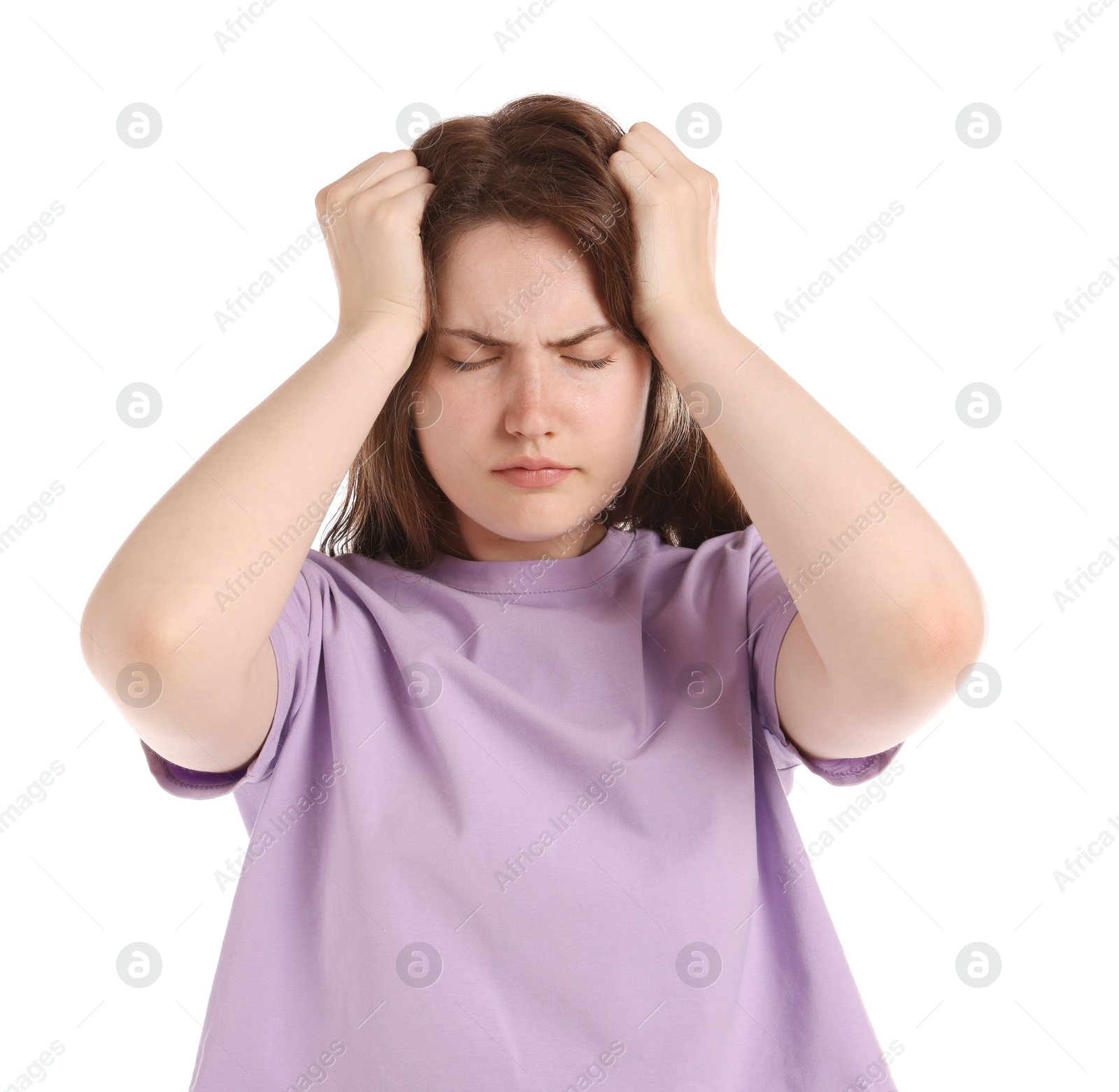 Young woman suffering from headache on white background Photo of Young woman suffering from headache on white background