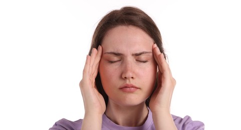 Photo of Young woman suffering from headache on white background