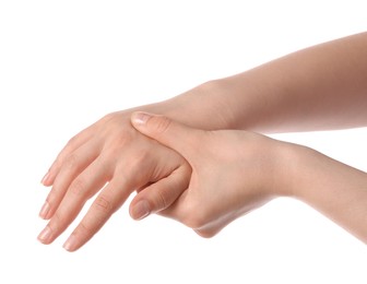 Photo of Young woman suffering from wrist pain on white background, closeup