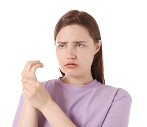Photo of Young woman suffering from wrist pain on white background