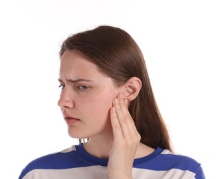 Photo of Young woman suffering from headache on white background