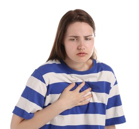 Photo of Young woman suffering from chest pain on white background