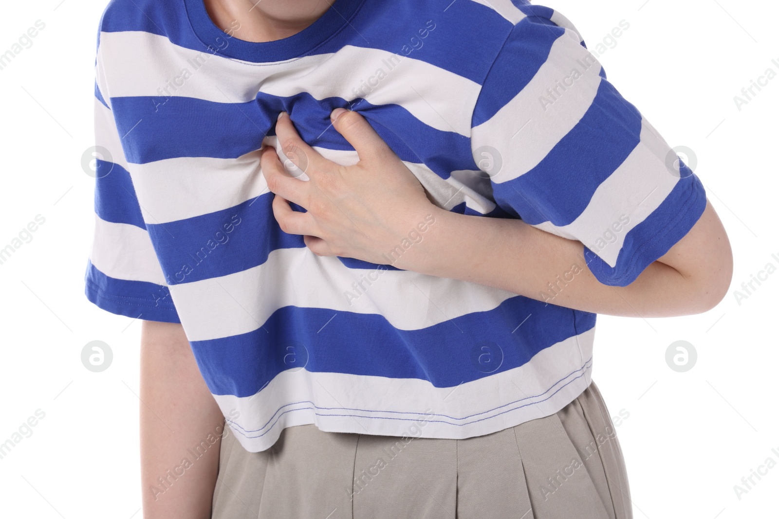 Young woman suffering from chest pain on white background, closeup Photo of Young woman suffering from chest pain on white background, closeup