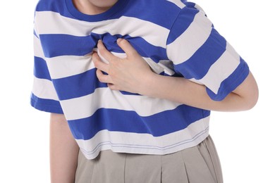 Photo of Young woman suffering from chest pain on white background, closeup