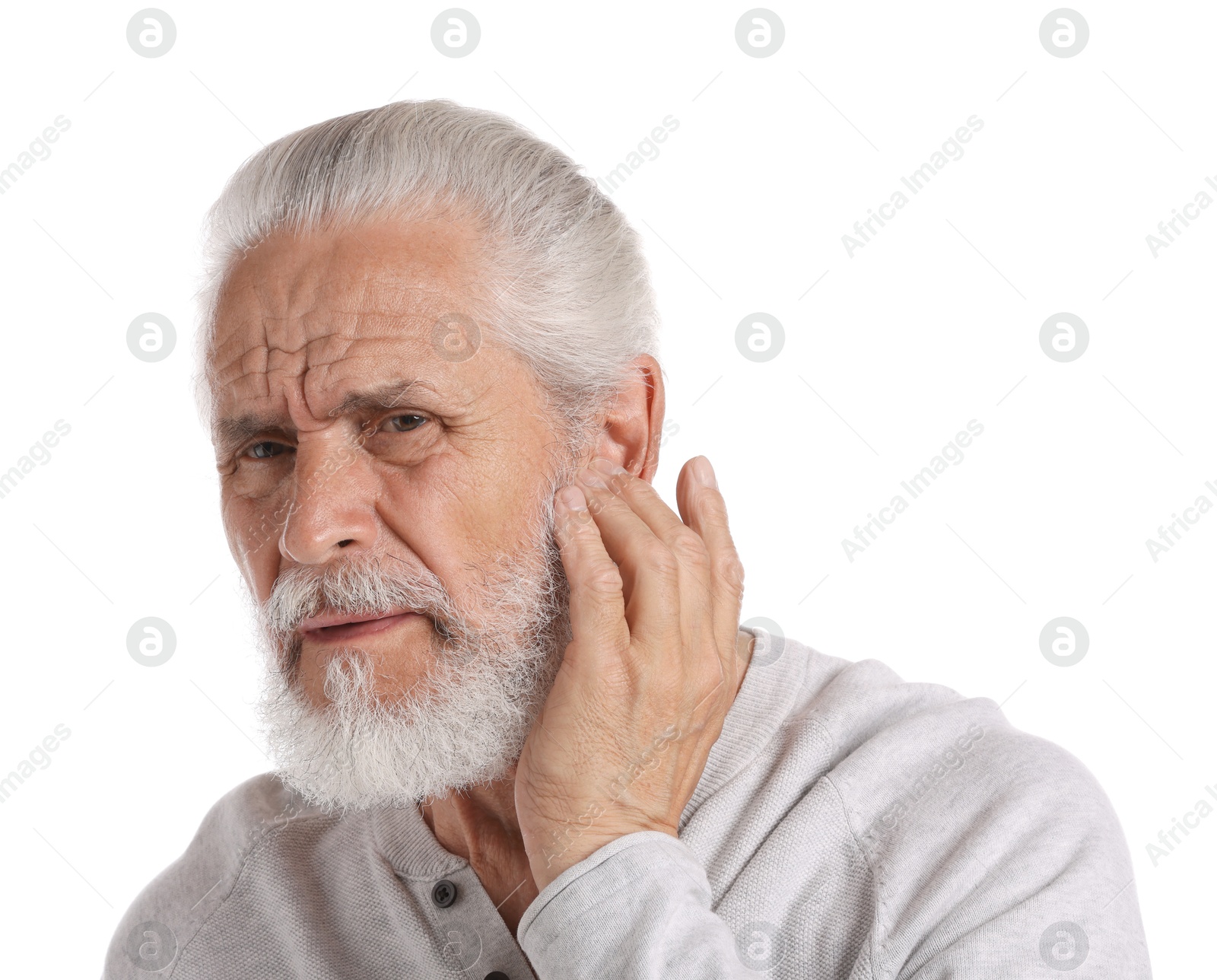 Photo of Senior man suffering from headache on white background